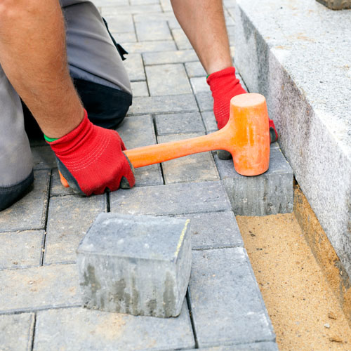 Patio. <br>
      Paved outdoor area adjoining a house, generally used for dining or recreation. Common materials employed when building a patio include concrete, stone, bricks but also tiles or cobbles.